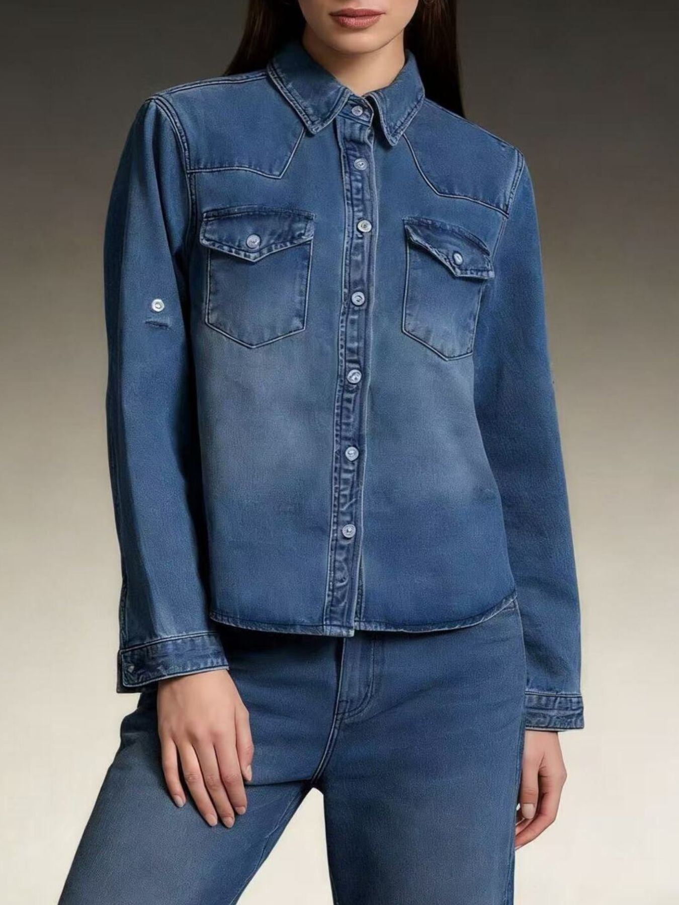 Classic blue denim overshirt with button-down front and chest pockets.