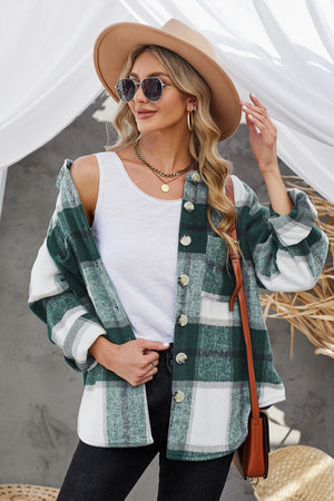 Oversized green and white checkered shacket with button front and patch pocket.