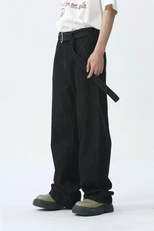 Black wide-leg denim jeans with a belted detail and a casual fit.