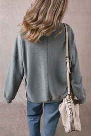 Relaxed fit ribbed sweatshirt in dark gray with a casual, comfortable style.