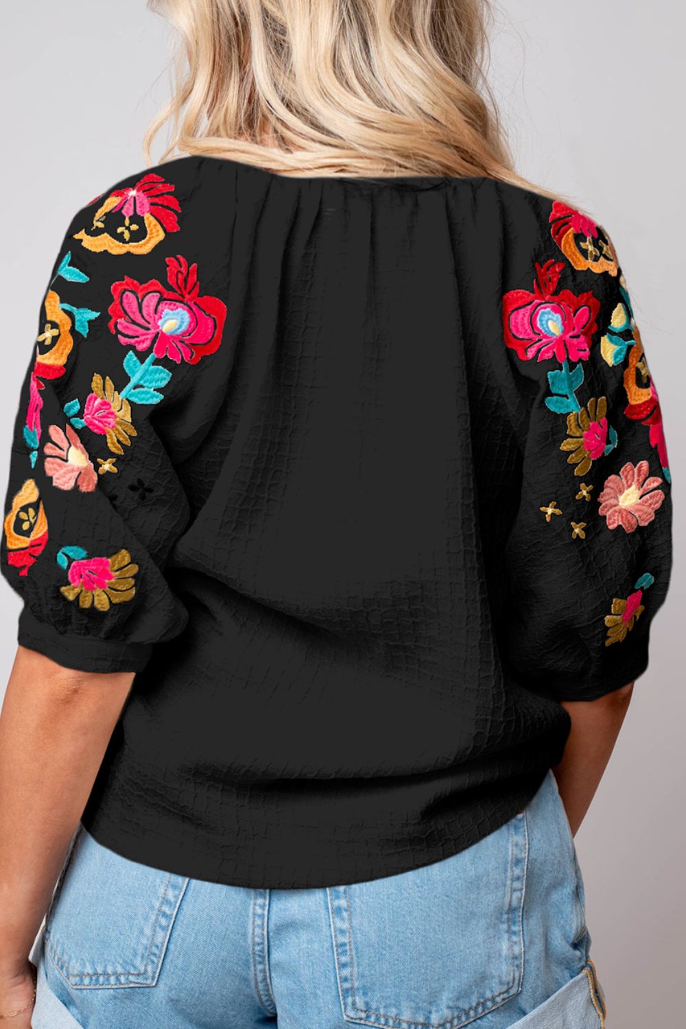 Black embroidered sleeve voluminous blouse with floral detail