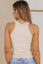 Eggshell knit halter top with scalloped neckline and hem detail