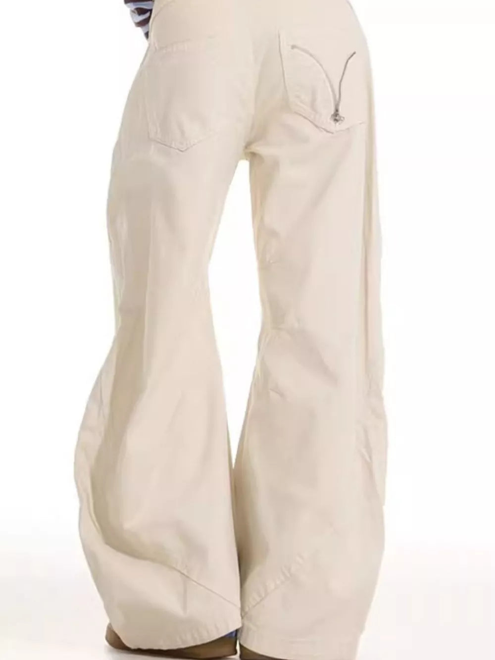 Men's cream wide-leg sweatpants with a zip detail on the back pocket.