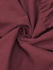 Belted ruffled hem maxi dress in red fabric texture detail