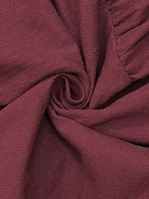 Belted ruffled hem maxi dress in red fabric texture detail