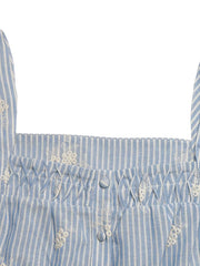 Blue and white striped peplum shirt with smocking and embroidered floral details.