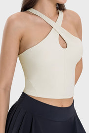 Cream halter crop top with keyhole detail and criss-cross straps