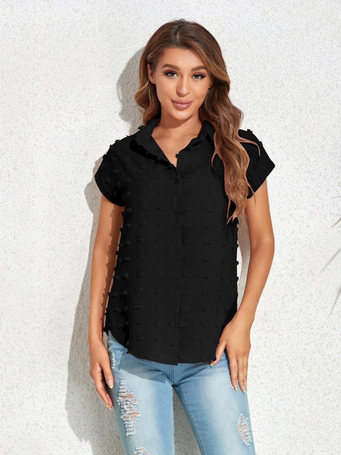 Black textured dot poplin shirt with short sleeves and a collared neckline.