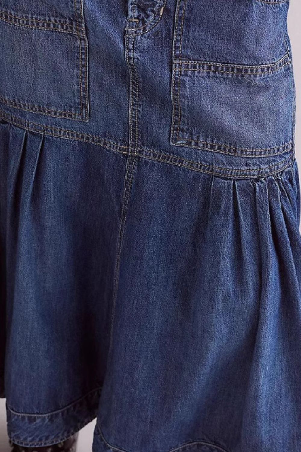 Denim midi skirt in dark wash with flounce hem and patch pockets