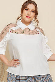 White blouse with sheer embroidered yoke and ruffle sleeves.