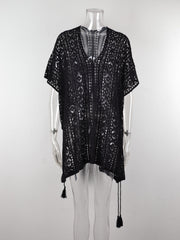 Black open-knit V-neck beach cover-up with short sleeves and tassel details.