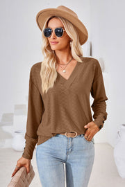 Brown textured v-neck blouse with button cuff detail