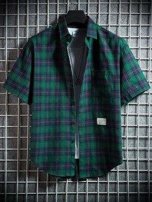 Green plaid short sleeve button-down shirt with chest pocket, cotton blend