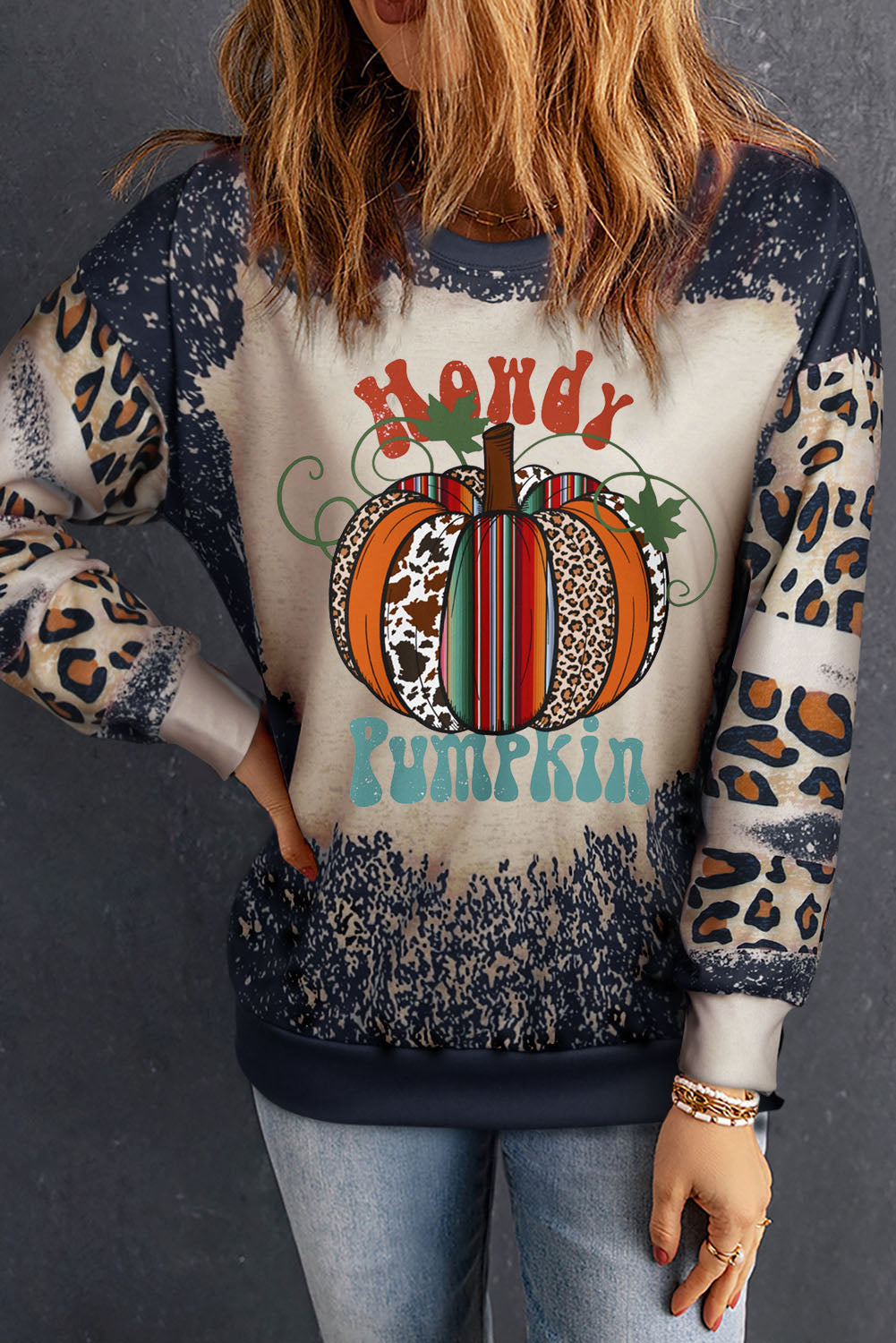 Bleached leopard graphic sweatshirt with Howdy Pumpkin print and distressed details.