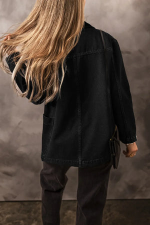 Black denim double-breasted blazer with two front pockets and a relaxed fit.
