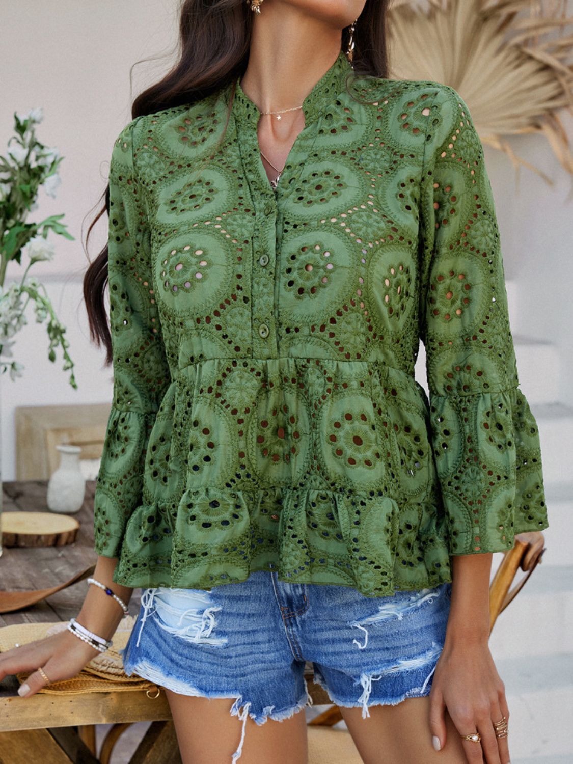 Moss green eyelet embroidered peplum blouse with ruffles and bell sleeves