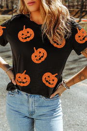 Black cotton tee with allover glitter pumpkin motif