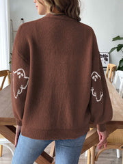 Brown balloon sleeve cardigan with white ghost motif on sleeves