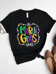 Black graphic t-shirt with Mardi Gras beads and text design.