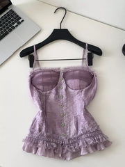 Purple lace ruffle hem tank top with button front and sheer bust detail.