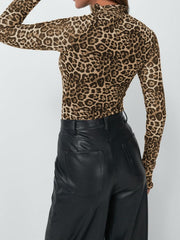 Leopard print mesh second-skin top with mock neck and long sleeves.