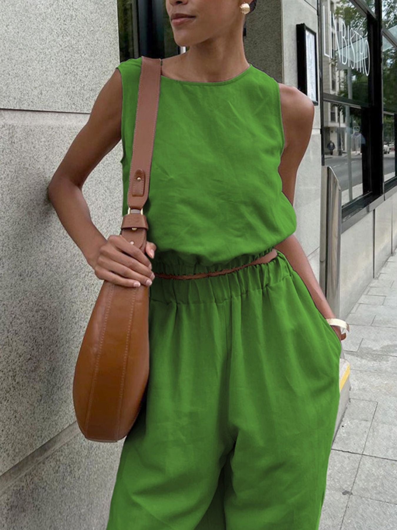 Sleeveless crop top and wide-leg pants set in tan cotton, crew neck.