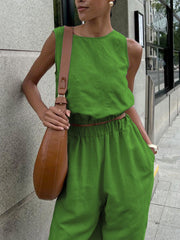 Sleeveless crop top and wide-leg pants set in tan cotton, crew neck.
