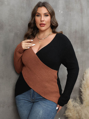 Colorblock crossover knit sweater in caramel and black acrylic with a deep V-neck.