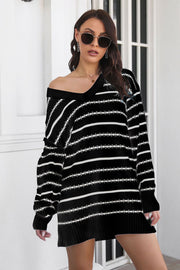 Black and white striped knit mini dress with a V-neck and off-the-shoulder styling.
