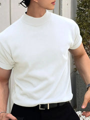 White mock neck knit tee with rolled short sleeves.