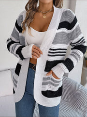 Colorblock open-front knit cardigan with white, black, and gray stripes.