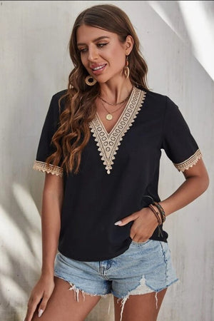Black V-neck blouse with lace trim and short sleeves