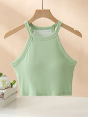 Ribbed halter crop top in Gum Leaf green with contrast stitching detail.
