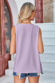 Lilac eyelet vest with pockets, sleeveless, round neck, breezy casual style.