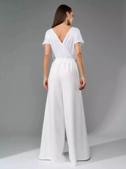 White sequin wrap top jumpsuit with wide-leg pants