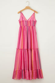Pink chevron stripe tiered maxi dress with cami straps and smocked bodice.