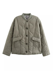 Moss green quilted button-down jacket with leopard print lining and chest pockets.