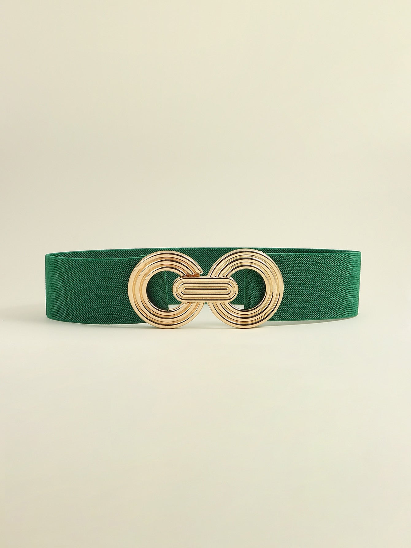 Green stretch belt with interlocking gold circles buckle
