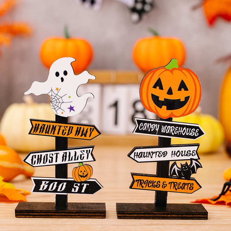 Halloween directional signs with ghost and pumpkin, multicolor festive decor.