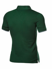 Men's green cotton polo shirt with short sleeves and grey trim.