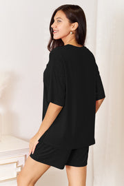 Black bamboo loungewear set with relaxed fit tee and shorts.