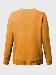 Ribbed trim V-neck knit sweater in mustard yellow with long sleeves and a relaxed fit.