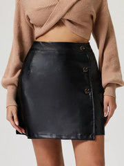 Black faux leather asymmetric mini skirt with button front detail