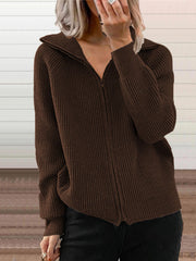 Brown ribbed knit zip-up trench coat with collar and pockets.