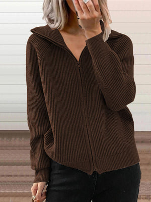Brown ribbed knit zip-up trench coat with collar and pockets.