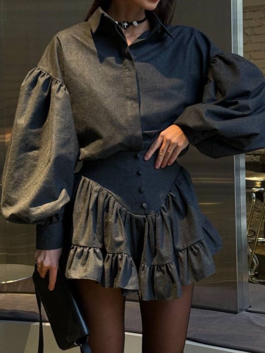 Dark gray plaid puff sleeve shirt and ruffled hem skirt set with button details.