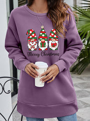 Purple tunic sweatshirt with Christmas gnomes graphic and Merry Christmas text.