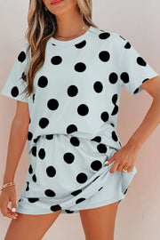 Light blue two-piece set with black polka dots, crew neck t-shirt and shorts.