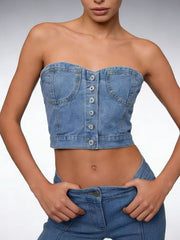 Structured denim tube top with button detail and pocket accents.