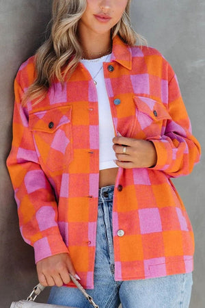 Overshirt with patch pockets in orange and pink check pattern, button front, collared, long sleeves.